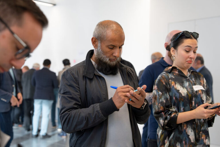 People in conversation during a networking session